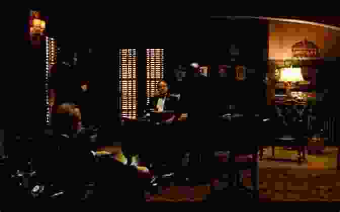 A Dramatic Scene Depicting A Confrontation Between Two Mafia Members In A Dimly Lit Warehouse Married To The Mafia 3: The Last Don