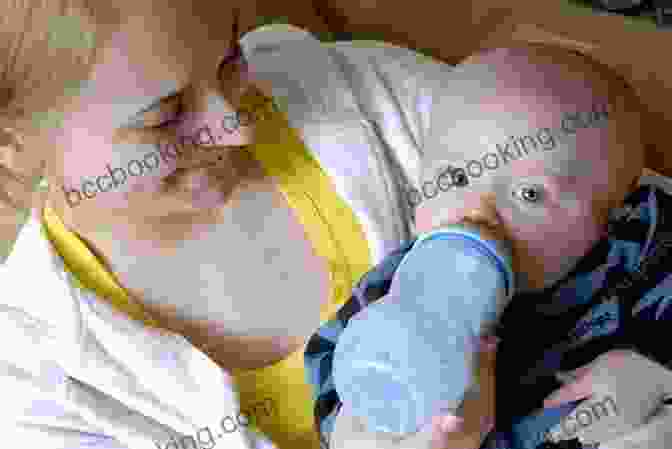 A Mother Gently Feeding Her Baby A Bottle In The Middle Of The Night The Baby Sleeps Tonight: An Essential Guide To Teaching Your Baby To Sleep Through The Night