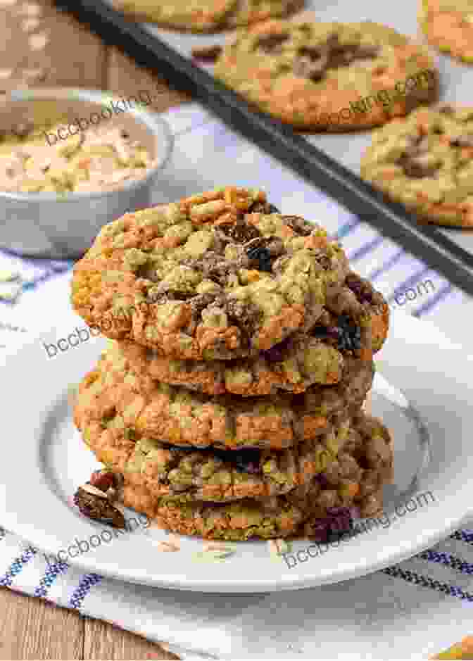 A Plate Of Oatmeal Raisin Cookies, With Plump Raisins And A Hint Of Cinnamon. Four Famous Cookie Recipes: Independent Author