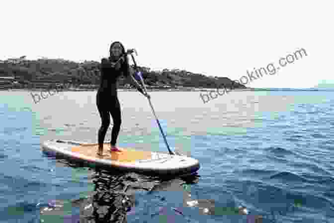 A Stand Up Paddler Attempting An Advanced SUP Maneuver How To Increase Your Stand Up Paddling Performance