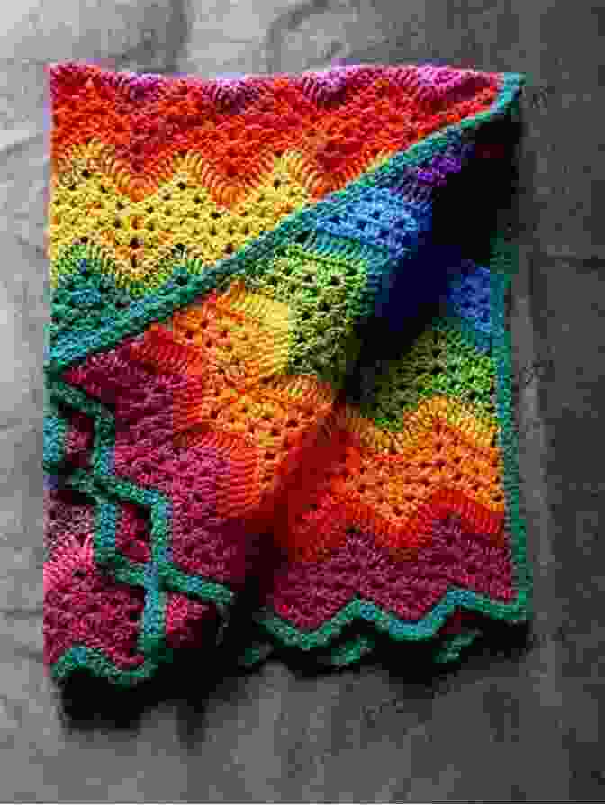 A Vibrant Knitted Blanket Showcasing A Symphony Of Colors The Essential Guide To Color Knitting Techniques: Multicolor Yarns Plain And Textured Stripes Entrelac And Double Knitting Stranding And Intarsia Mosaic And Shadow Knitting 150 Color Patterns