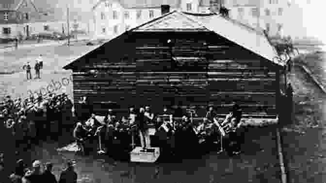 A Young Boy Playing The Violin In A Concentration Camp. Boy With A Violin: A Story Of Survival