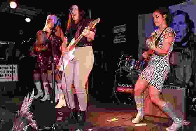 An Image Of A Female Punk Band Performing On Stage With A Diverse Crowd In The Background. Spitboy Rule: Tales Of A Xicana In A Female Punk Band