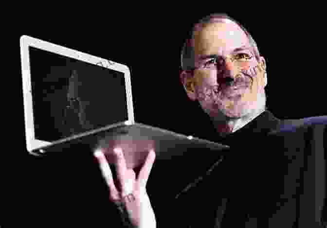 Apple Co Founder Steve Jobs Holding A Computer The Unauthorized Look At Steve Jobs 101 Genius Ideas To Success